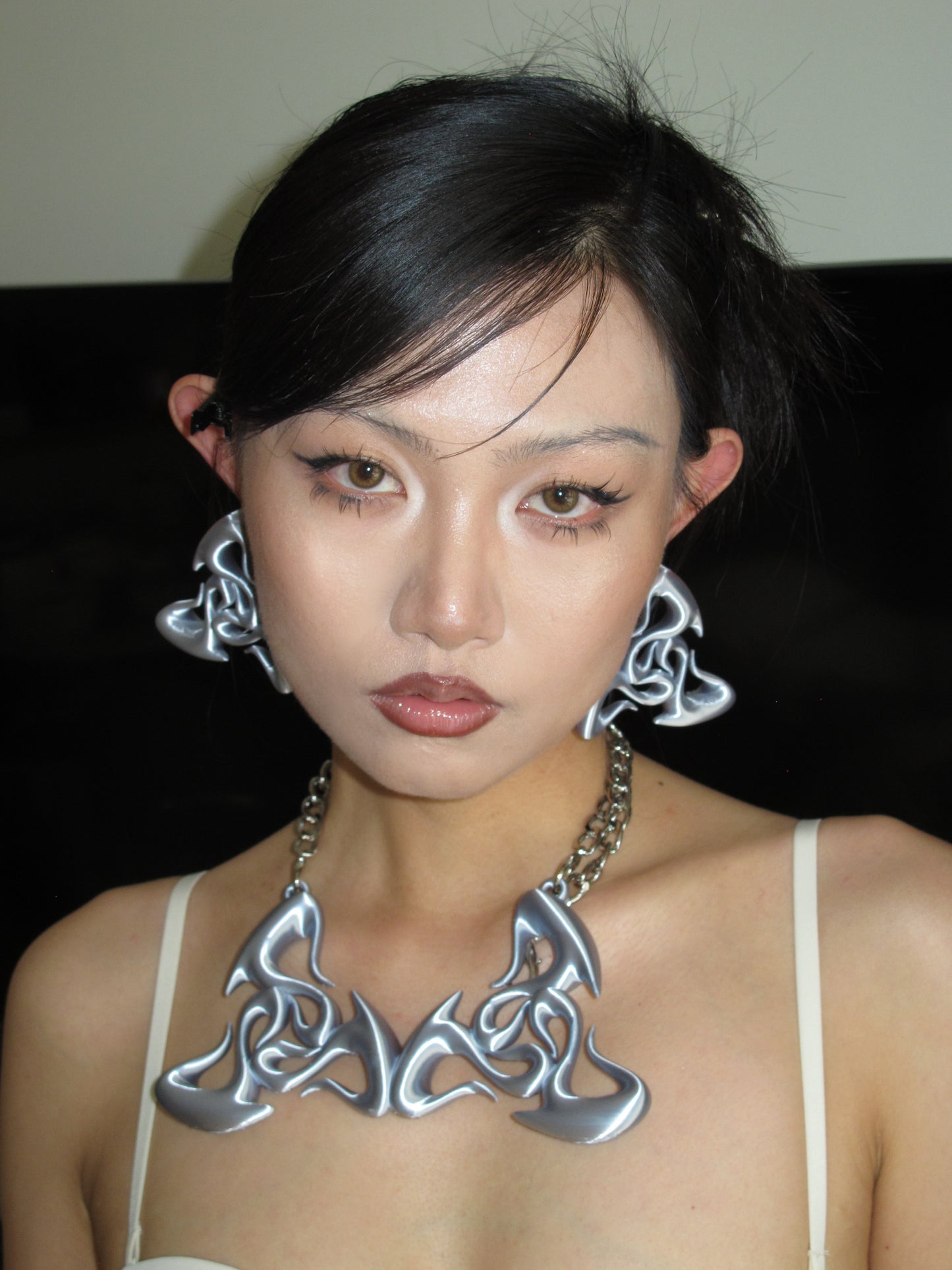 YALA.Lab | 3D printed biochemical triangular totem futuristic tech accessory set for Y3K girl with exaggerated earrings and necklaces