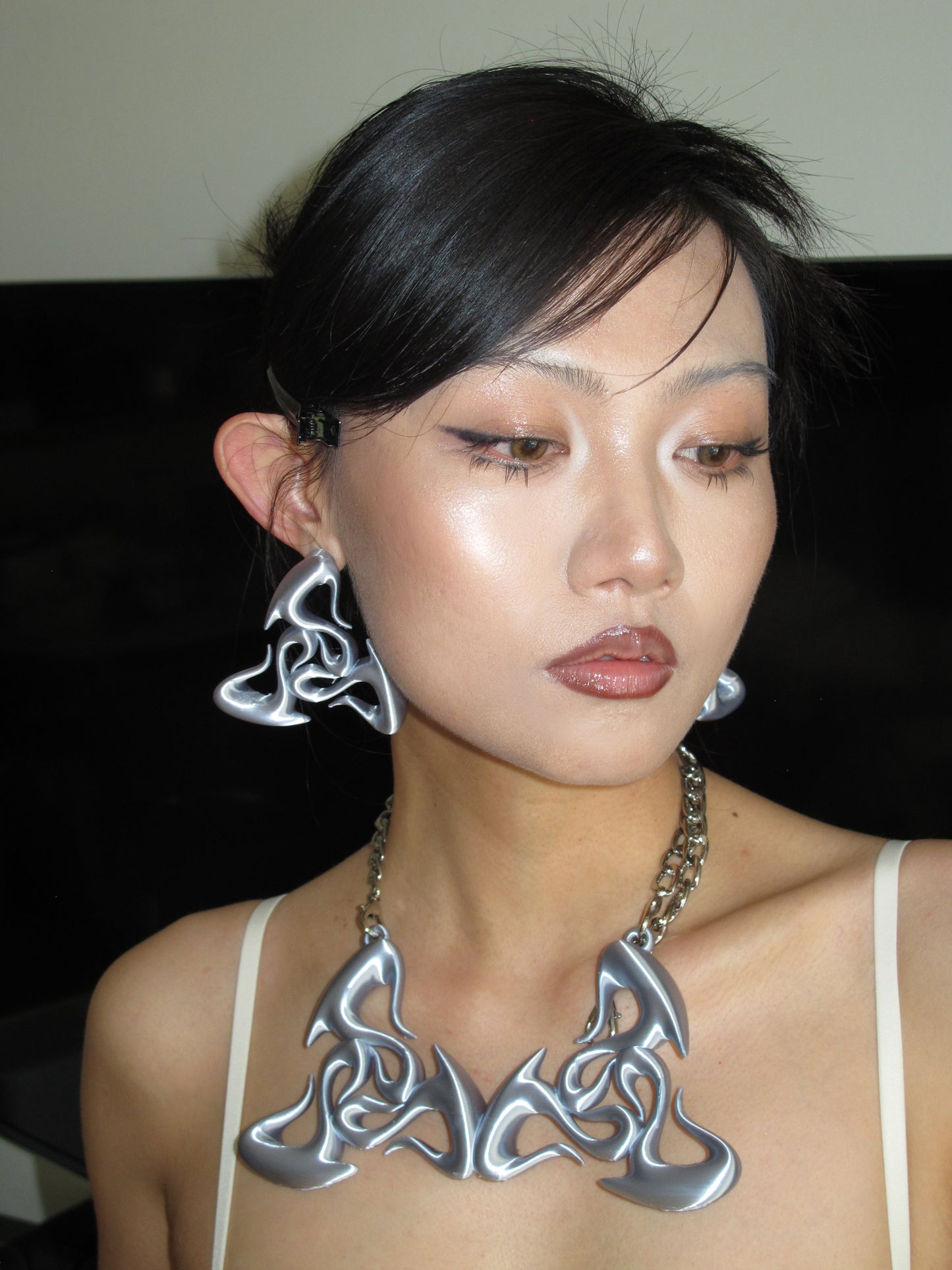 YALA.Lab | 3D printed biochemical triangular totem futuristic tech accessory set for Y3K girl with exaggerated earrings and necklaces