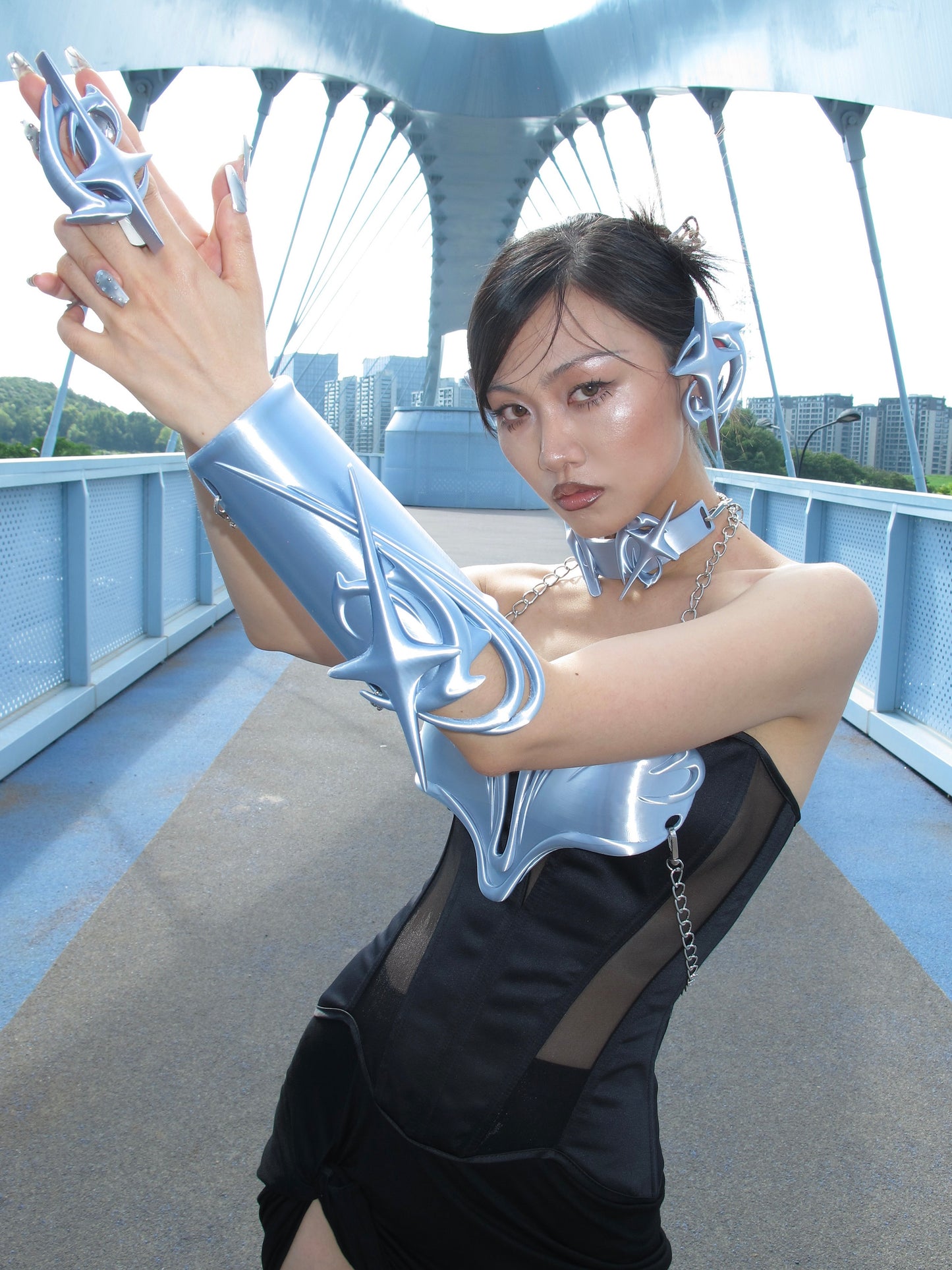 YALA.Lab | 3D printed tetrahedron futuristic tech-themed electronic Y3K girl gauntlets