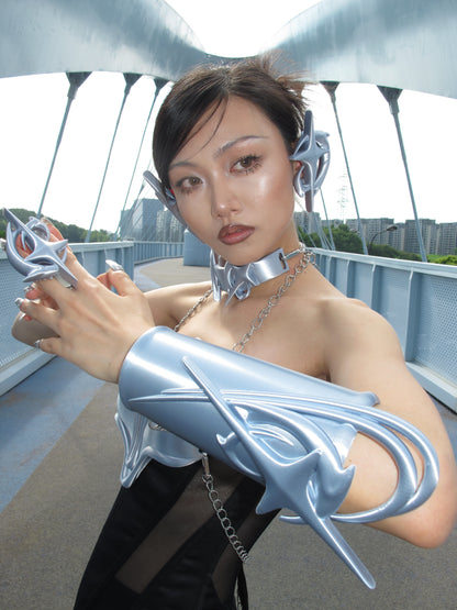YALA.Lab | 3D printed tetrahedron futuristic tech-themed electronic Y3K girl gauntlets